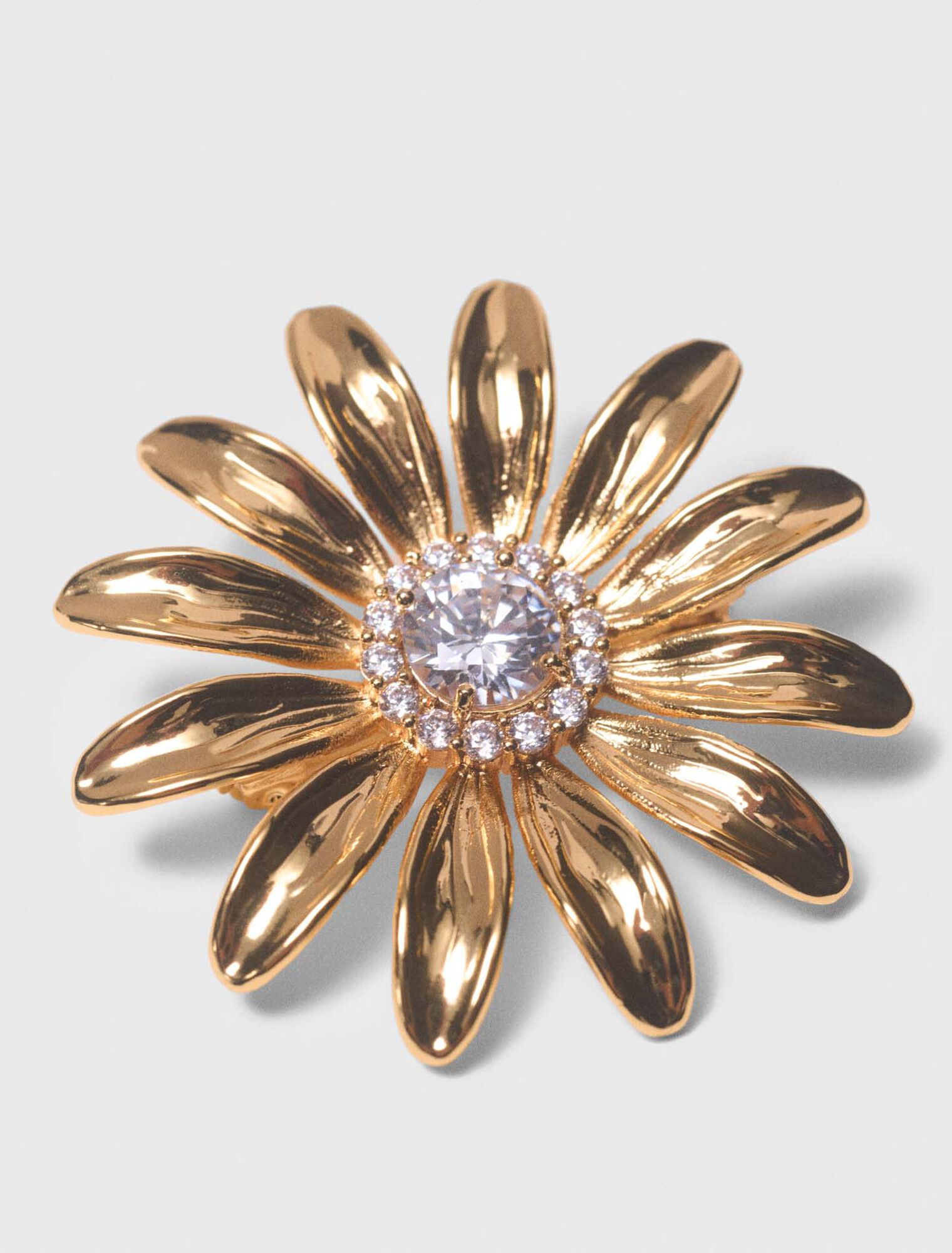 Gold rhinestone flower brooch